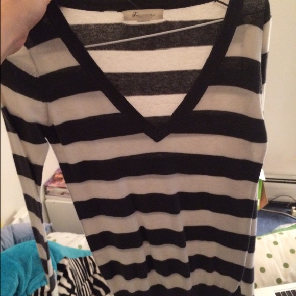 Black and white stripped V neck sweater