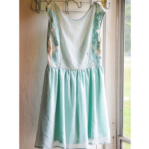 Mint Francesca's dress with plunge back.