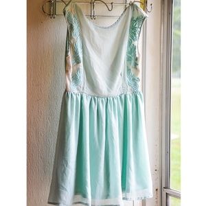 Mint Francesca's dress with plunge back.