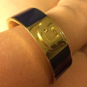 C Wonder "J" navy blue and gold colored bangle