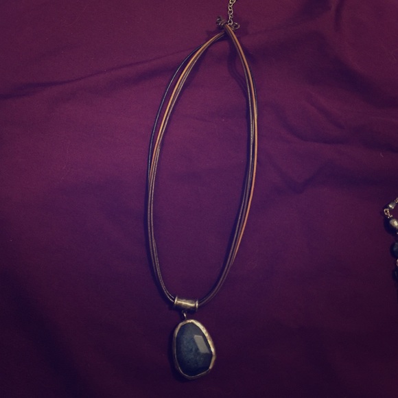 Brown leather necklace with blue pendant