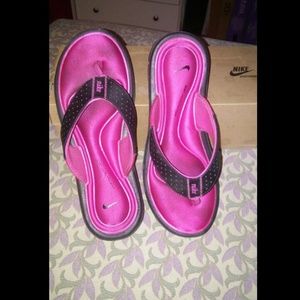 Pink and black nike sandles