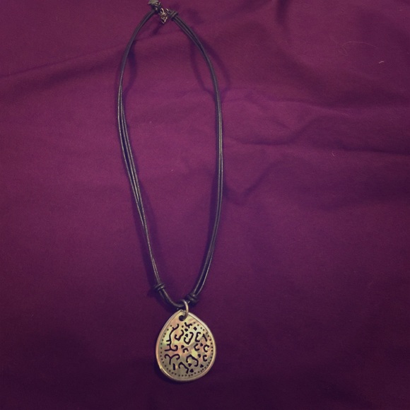 Brown leather necklace with pendant