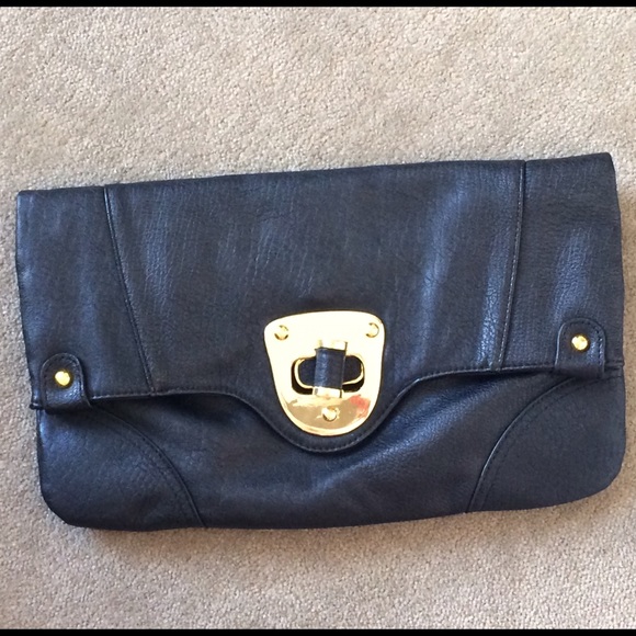 Black faux leather fold over clutch!