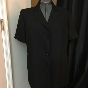 2pc black skirt suit. Two button longer jacket