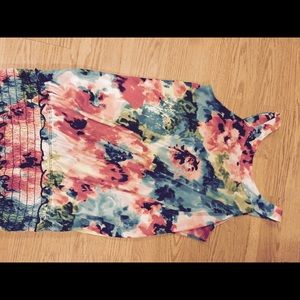 Silk Top with elastic waist.