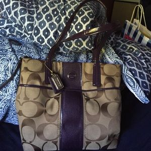 Tan and purple coach purse. Real coach purse