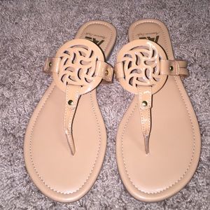 Nude color sandals...never worn