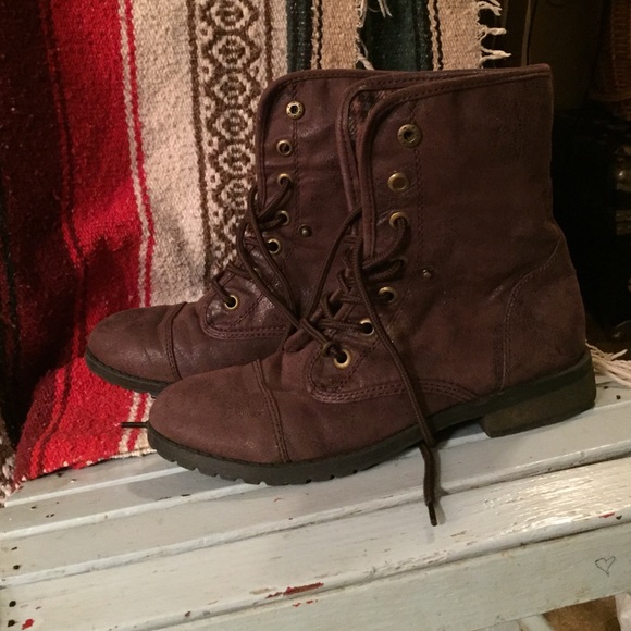 Brown combat boots with flannel inside
