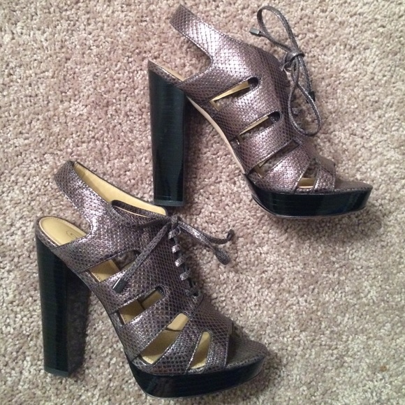 Coach Tie Up Metallic Pumps