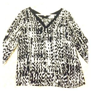 Black and white v-neck blouse, size medium.