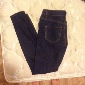 Dark blue with brown-goldish stitching jeans.