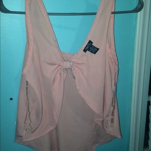 Pink shirt with a bow