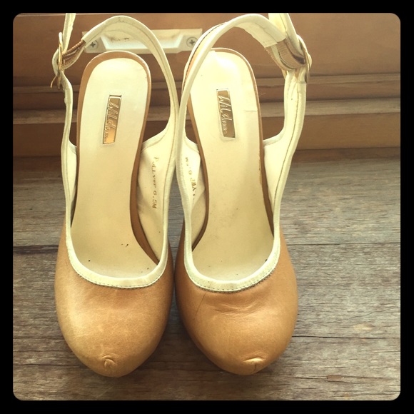 Tan sling backs with white trim