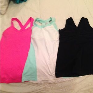 3 ladies Lululemon tanks, size 2