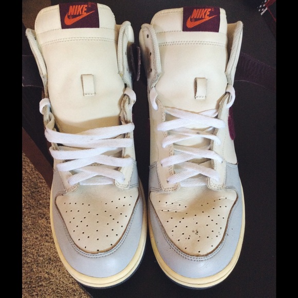 Nike dunks cream and burgundy.