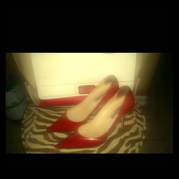 Jimmy Choo Red Pumps - too sexy, may have to keep
