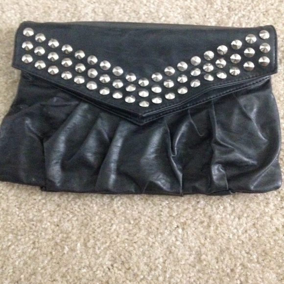 Small studded clutch. Good condition.