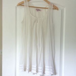 Calypso white crepe baby doll tank.
