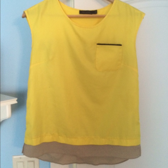 the limited bright yellow tank top