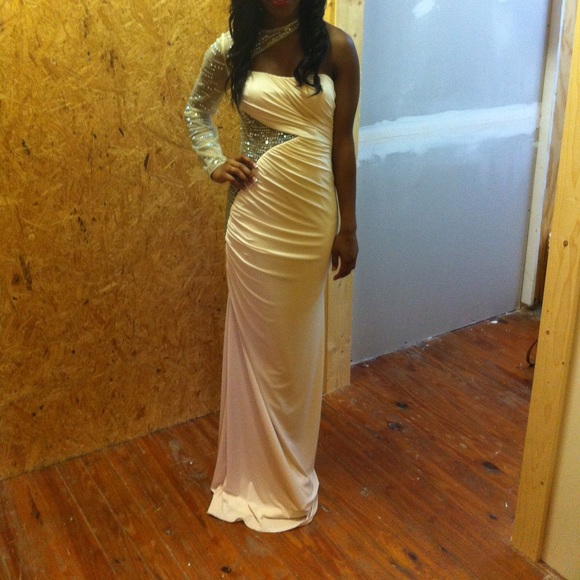 White one shoulder dress.