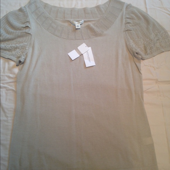 Beige sweater with some lace at the shoulders