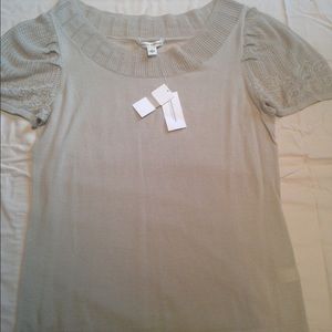 Beige sweater with some lace at the shoulders