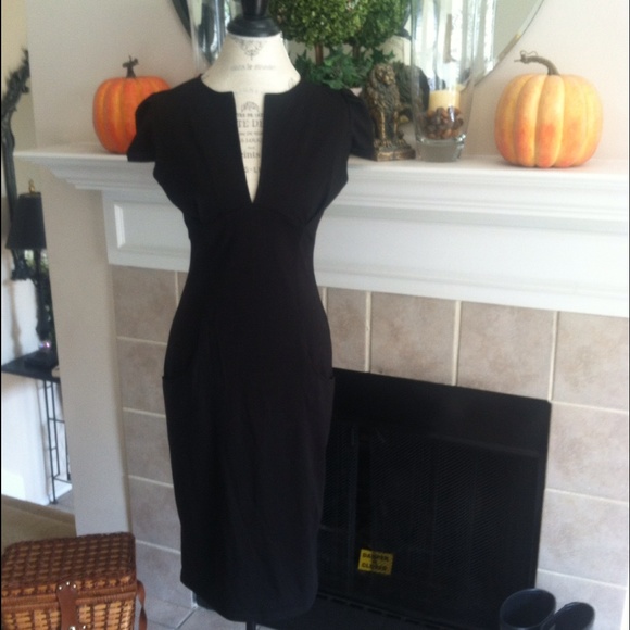 Dresses & Skirts - Large Black Wiggle Dress with pockets NWOT