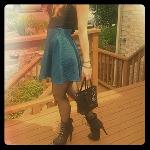 Black high heeled boots