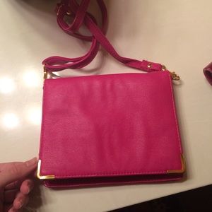 Hot pink cross body clutch