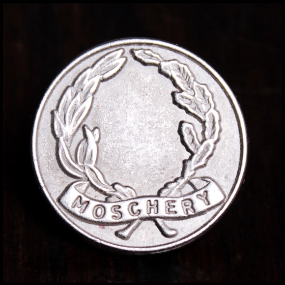 A beautiful silver coin pin