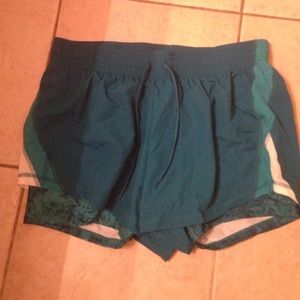 Teal shorts w/ spandex underneath