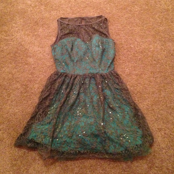 Teal fit and flare dress with grey lace overlay