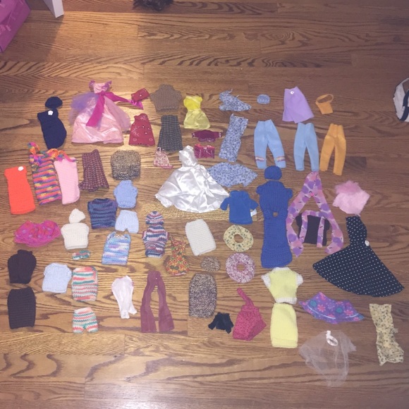Barbie Clothes, carrying case, and Barbie!