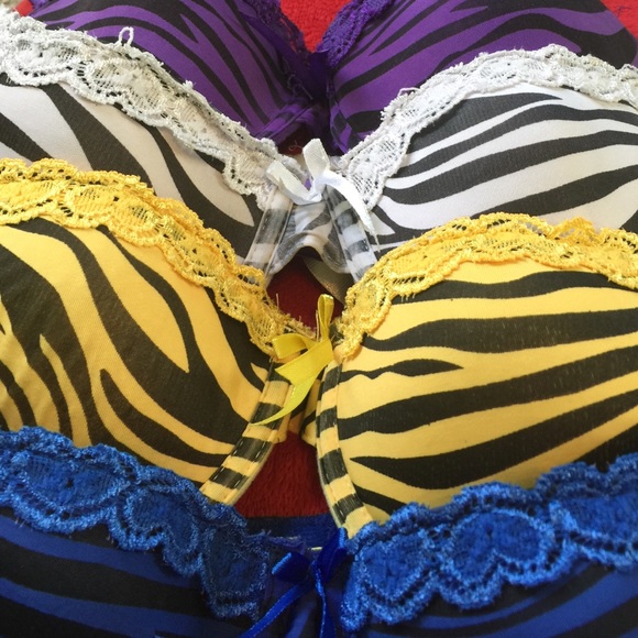 4 never worn before zebra print bras