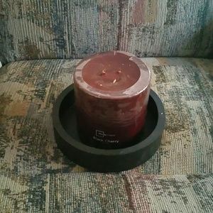 Black cherry candle inside a pillar bowl