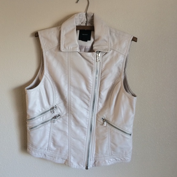 Off-white faux leather vest.
