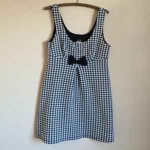 Black and white patterned dress.