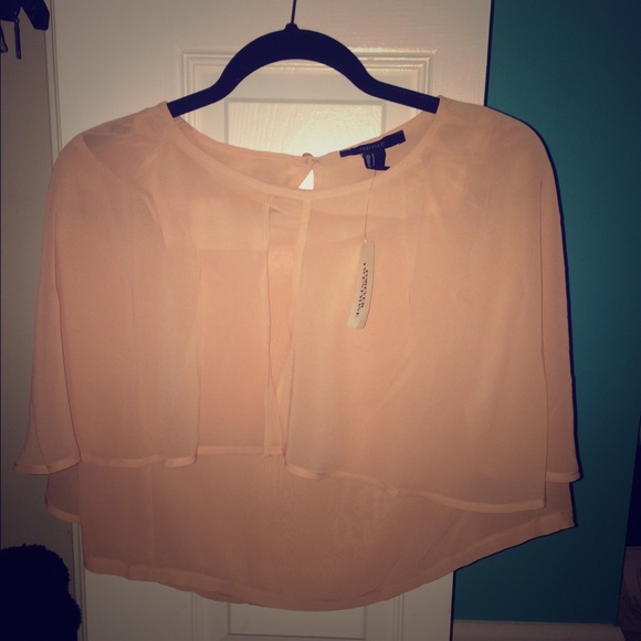 A cute light pink casual top!