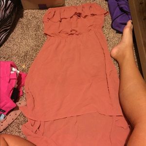 A high low peach color strapless dress