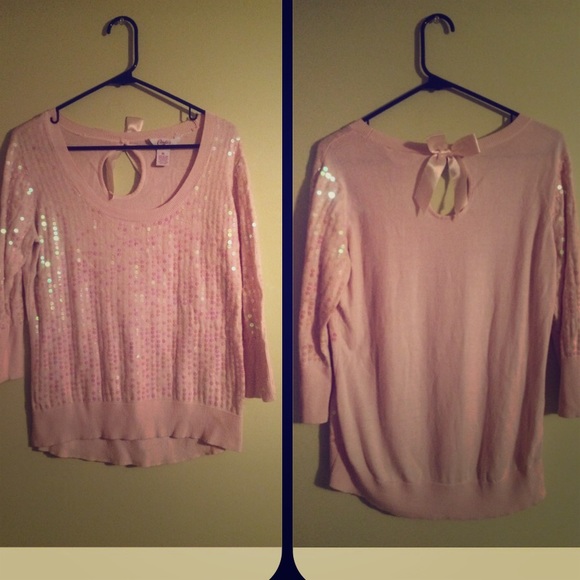 A light pink sweater