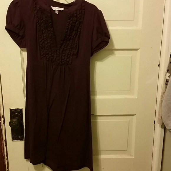 Dark purple dress.