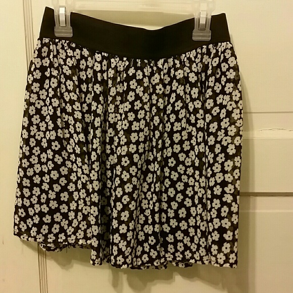 White and black floral skirt.