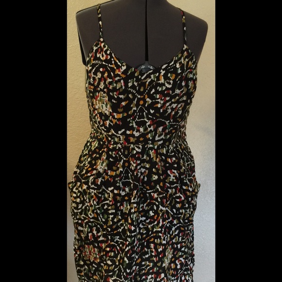 Adorable dress, black background, two pockets