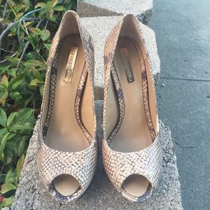 A Bcbgmaxzria snake printed high heels