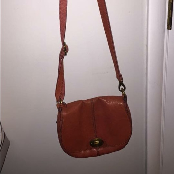 Cross body reddish orange fossil purse