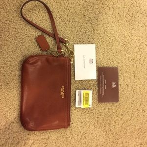 Brown Coach wristlet