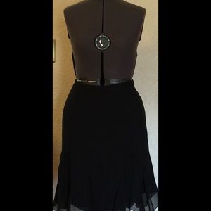 Swinging multi-level hemline!