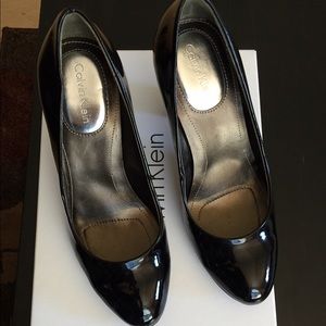 Calvin Klein black patent pumps
