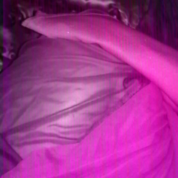 A purple and pink dress . - Picture 3 of 3